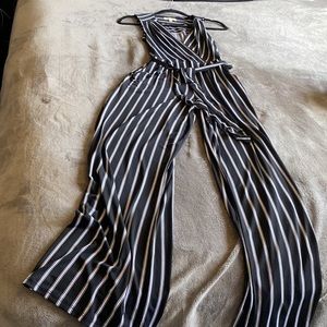 Women’s stripe jumpsuit with pockets on both sides, size small, brand monte a u.